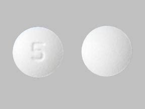 <b>5</b> mg/325 mg. . Round pill 5 on one side